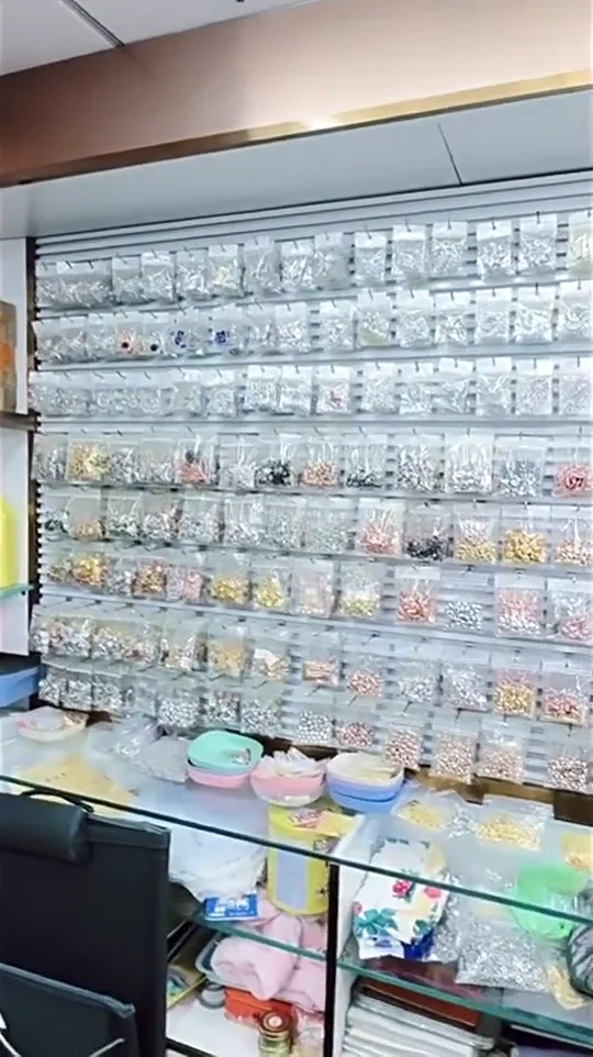 Rows of metal findings and jewelry-making parts